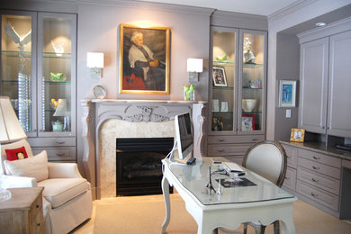 Inspiration for a large timeless freestanding desk carpeted study room remodel in New York with a standard fireplace, a stone fireplace and purple walls