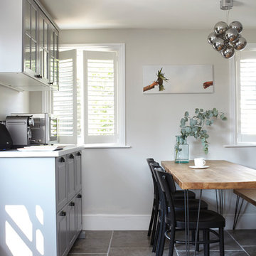 Contemporary-styled grey shaker kitchen
