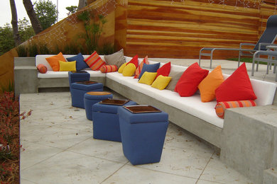 Example of a mid-sized trendy concrete patio design in Los Angeles with no cover