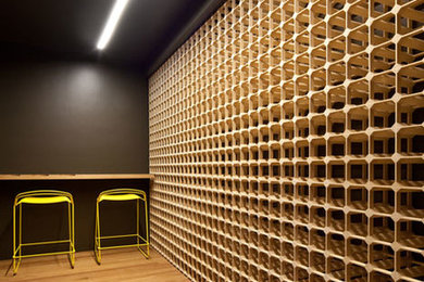 Photo of a contemporary wine cellar in Sunshine Coast.