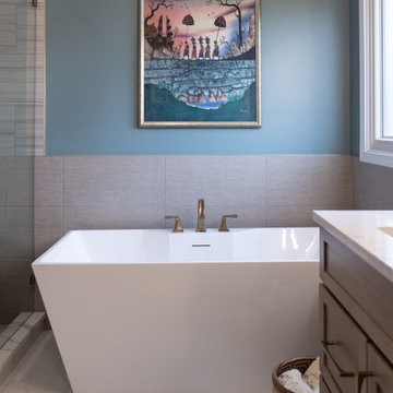 Spa Like Primary Bathroom Remodel with Warm Wood & Brass Details