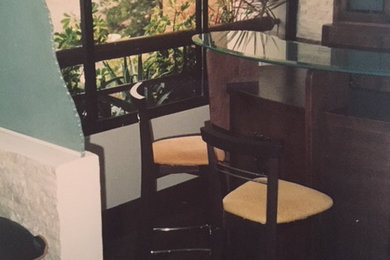 Inspiration for a rustic home bar remodel in Other