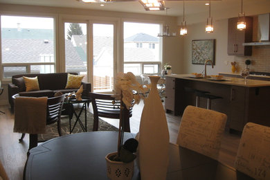 Minimalist dining room photo in Calgary