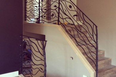 Inspiration for a contemporary staircase remodel in Edmonton