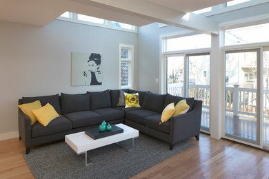 Example of a trendy family room design in Boston