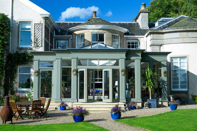 This is an example of a large traditional two floor detached house in Other.