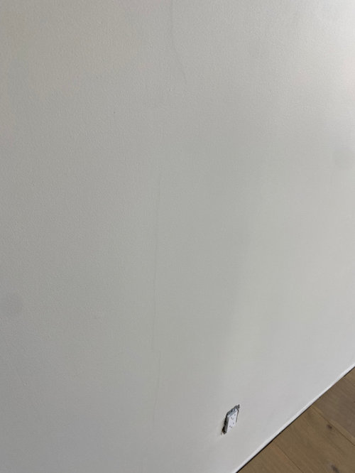 What is causing these drywall bends in wall?