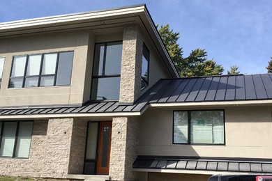 Example of a trendy home design design in Other