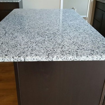This exquisite Luna Pearl was the perfect finishing touch for this kitchen.