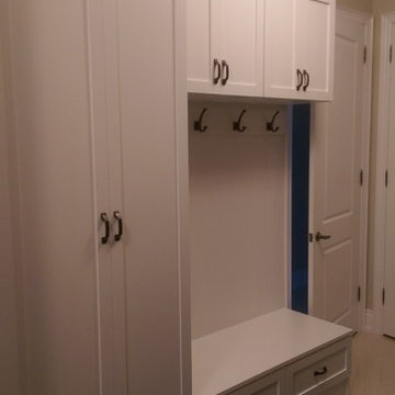 Mudroom closets, coat rack and bench