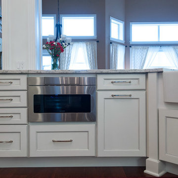 Traditional White Kitchen with Retro Stove and Beverage Center