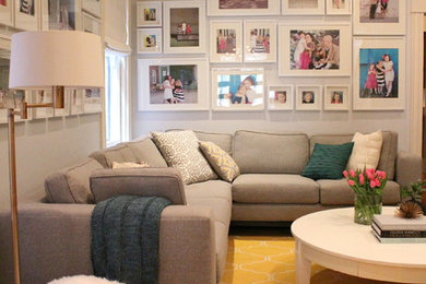 Living room - transitional medium tone wood floor living room idea in Richmond with gray walls