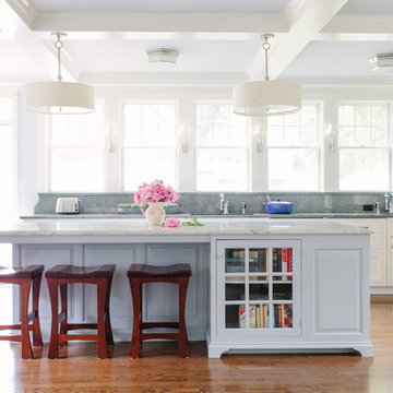 Large gray blue island anchors the space