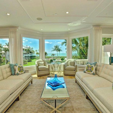 Unique Living Room Spaces Using Aqua and Beige Vanguard Furniture