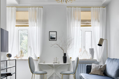 Medium sized contemporary formal and grey and white open plan living room in London with white walls, ceramic flooring, a wall mounted tv, white floors, a drop ceiling and feature lighting.