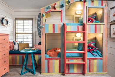 Design ideas for a large nautical gender neutral kids' bedroom in Minneapolis.