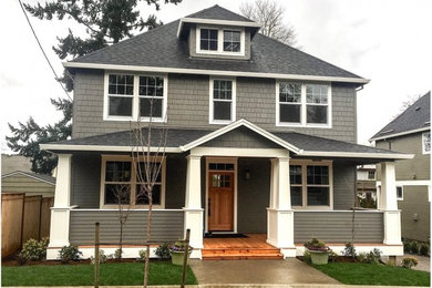 Mid-sized arts and crafts gray two-story wood exterior home photo in Portland
