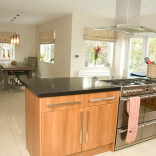 Example of a cottage chic home design design in Surrey