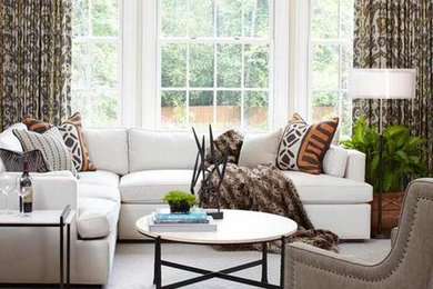 Living room - mid-sized eclectic formal and enclosed dark wood floor living room idea in Orange County with beige walls