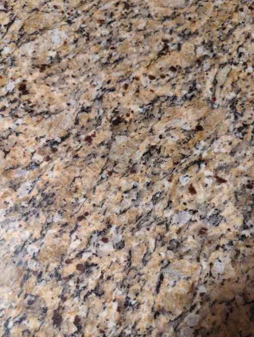 Wall paint colours with Santa Cecilia granite countertops.