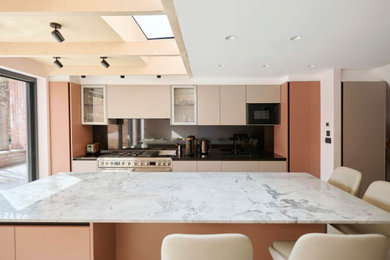 This is an example of a contemporary kitchen in London.