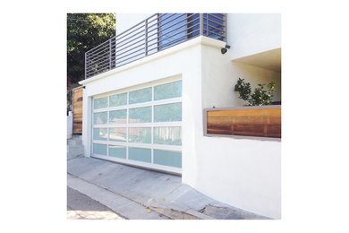 Example of a large trendy white three-story concrete exterior home design in Los Angeles