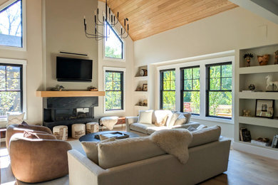 Example of a transitional living room design in Manchester