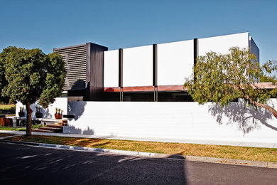 Inspiration for a contemporary white exterior in Melbourne.