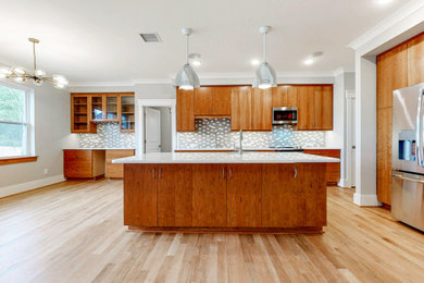 Kitchen - contemporary light wood floor kitchen idea in Other with glass tile backsplash