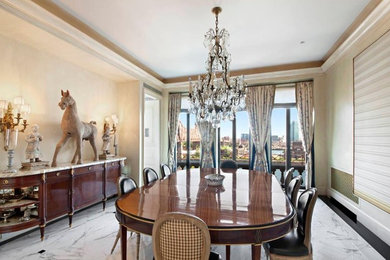 Enclosed dining room - large traditional marble floor enclosed dining room idea in New York with green walls and no fireplace