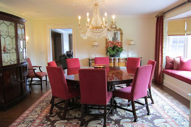 Large traditional separate dining room in New York with white walls, medium hardwood floors, brown floor and no fireplace.