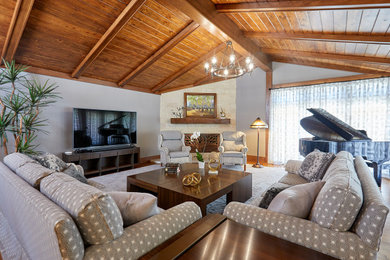 Photo of an arts and crafts family room in Orange County.