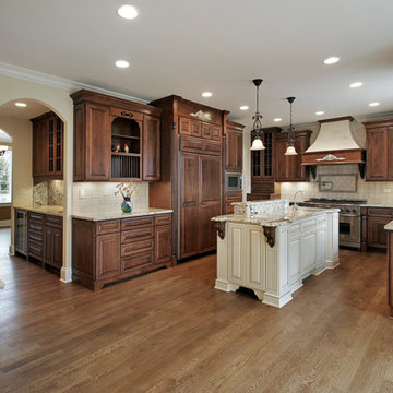 Alaska White Granite Countertop with travertine back splashes