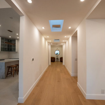 Skylit Corridor Toward the Entry Foyer