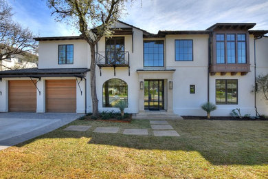 Example of a large classic home design design in Austin