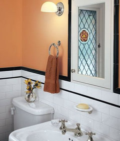 What color wall in an all white tile bathroom?