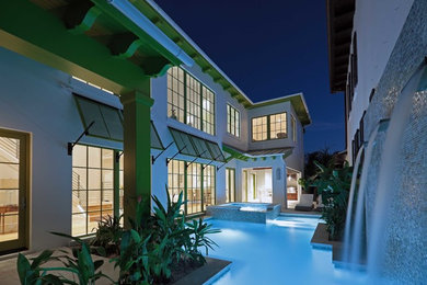 Example of an island style pool design in Miami