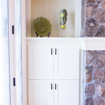Fireplace flanked with Bookshelves
