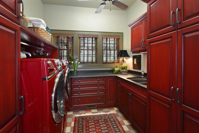 Laundry room - traditional laundry room idea in Charlotte
