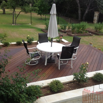 Ipe Hardwood Decking with Metal Framing, Limestone Flower Beds around Deck