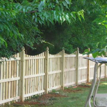Scalloped Top Semi-Privacy Fence with French Gothic Posts