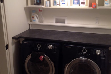 Example of a trendy laundry room design in Toronto