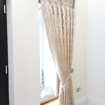 Deluxe entrance hall curtains tied back