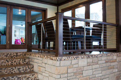 Pool house - huge traditional indoor tile and l-shaped pool house idea in Other