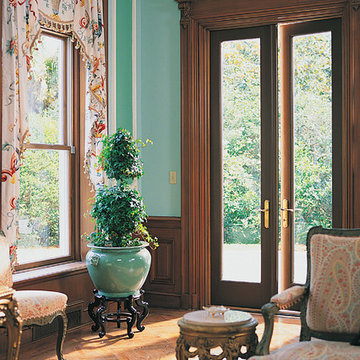 Transform your living room space w/Pella® Architect Series® hinged patio doors