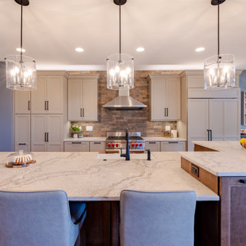 Transitional Two Tone Gray Kitchen with Appliance Panels