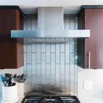 Vertical Subway Backsplash with Large Stainless Steel Tiles