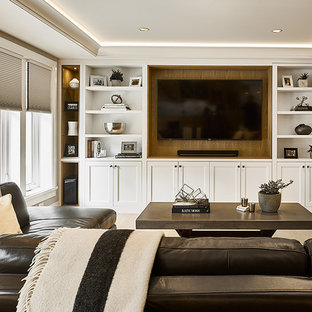 Inspiration for a medium sized classic enclosed home cinema in Vancouver with white walls, light hardwood flooring, a built-in media unit and brown floors.