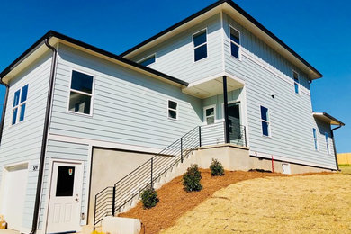Example of a mid-sized minimalist two-story house exterior design in Atlanta