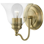 Livex Lighting - Moreland 1 Light Antique Brass Vanity Sconce - Bring a refined lighting style to your bath area with this Moreland collection one light vanity sconce. Shown in an antique brass finish and clear glass.